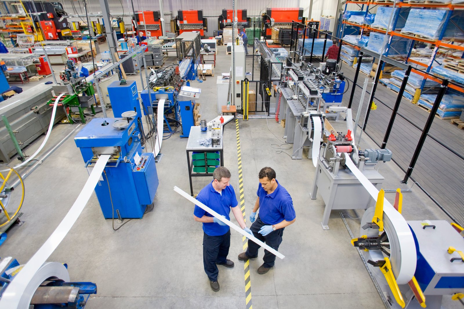HVAC technician performing preventive maintenance on industrial cooling equipment